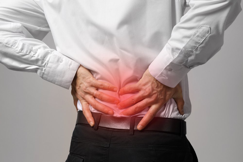 Can Back Problems Cause Stomach Pain?